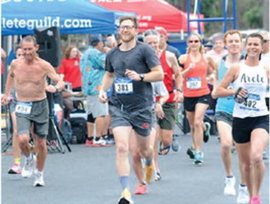 Every year, runners gather in downtown Fredericksburg at Marktplatz in late April to participate in the Fredericksburg Wildflower Run. – Standard-Radio Post/Brent Burgess